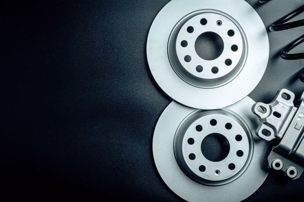 Close-up of a car brake disc and caliper relevant to brake repair services in Hamilton
