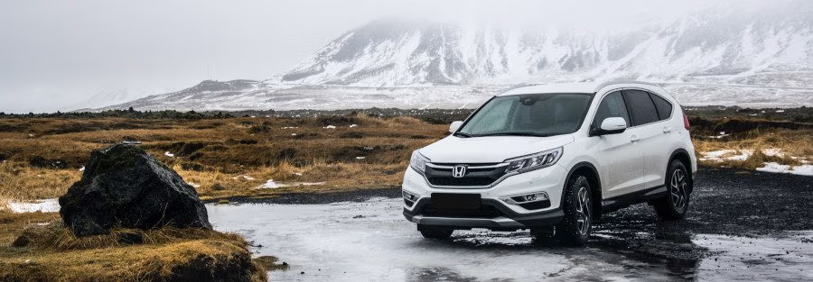Car parked outside in winter needing maintenance