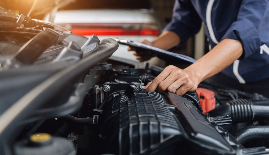 CRS Automotive Hamilton technician discussing repair estimate with customer