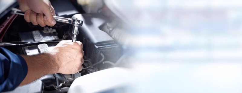 Mechanic working on vehicle at CRS Automotive service centre in Hamilton