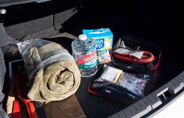 Emergency winter road trip kit essentials for long-distance driving