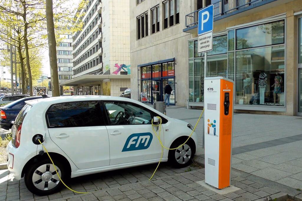 Electric vehicle charging station at a public lot in Hamilton