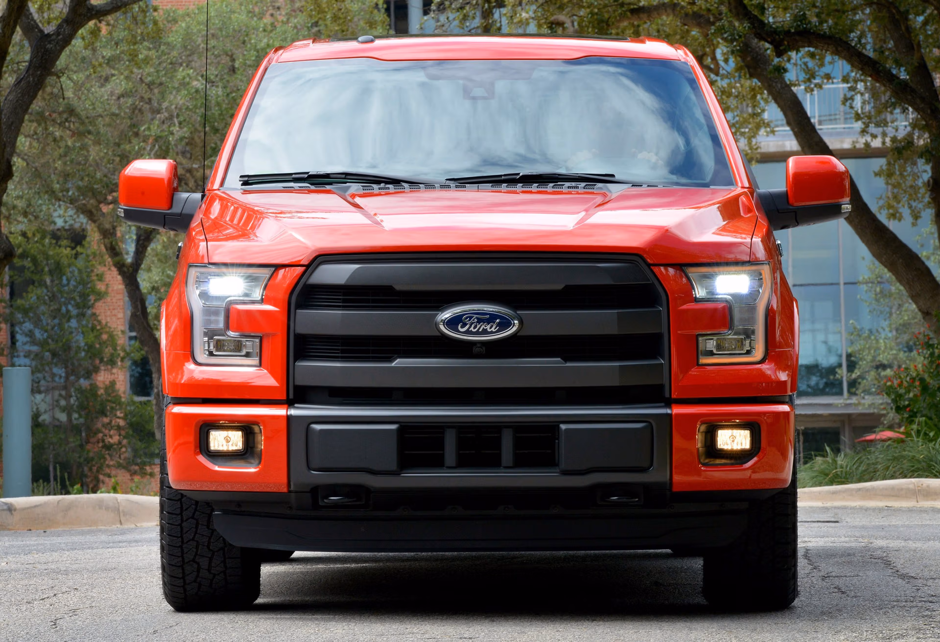 Ford F-150 pickup truck parked, showing side view