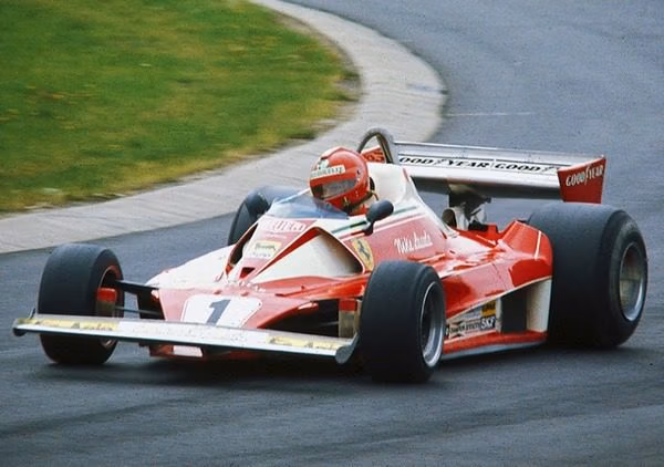 Niki Lauda in Ferrari 312T2 Niki Lauda driving the Ferrari 312T2 racing car