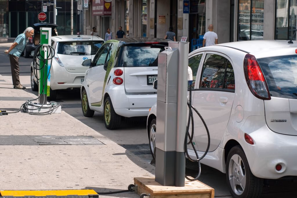 Electric vehicles at a ride-and-drive event promoting plug-in adoption in Ontario